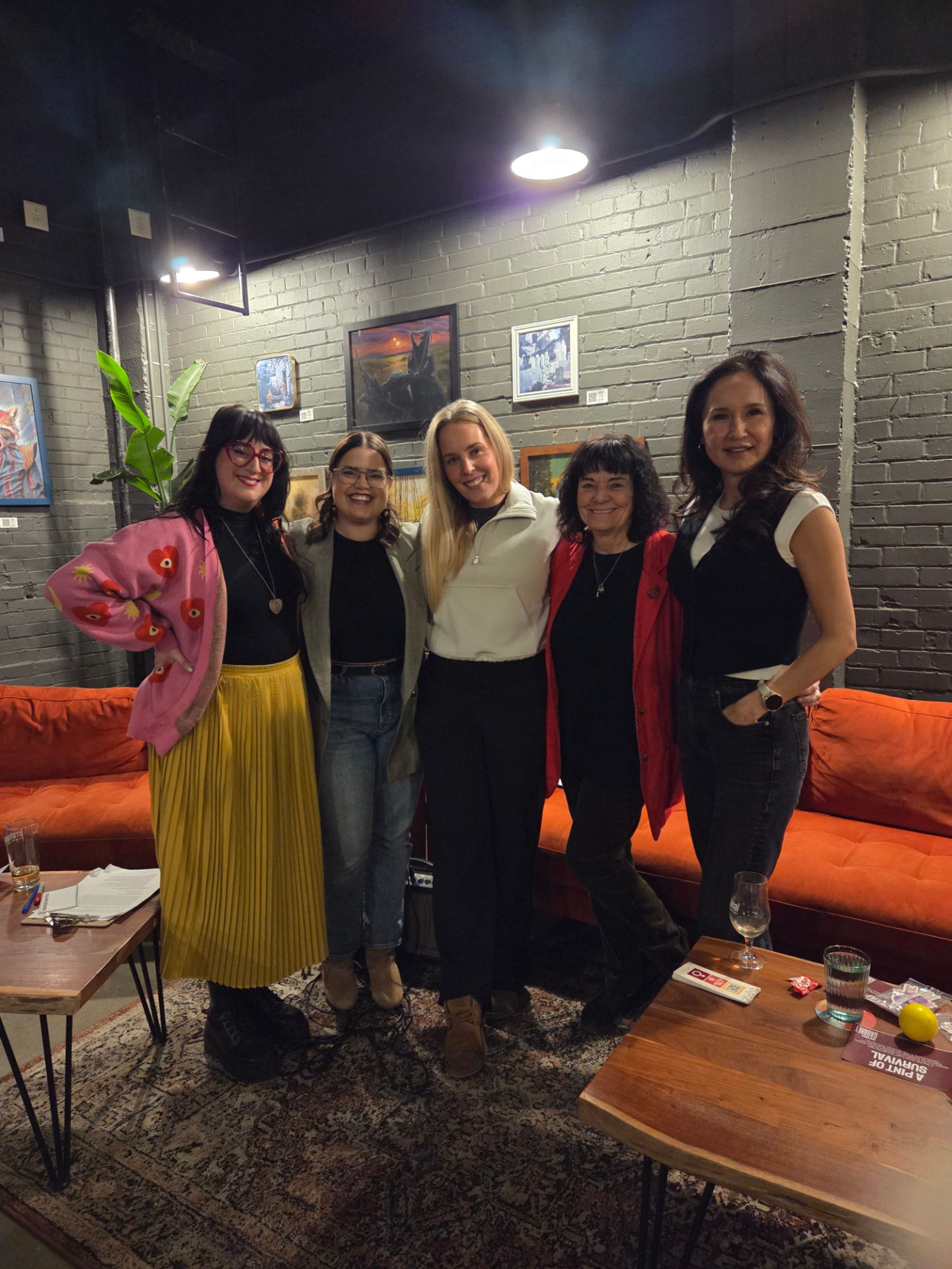 Brooke with a group of women at a community event